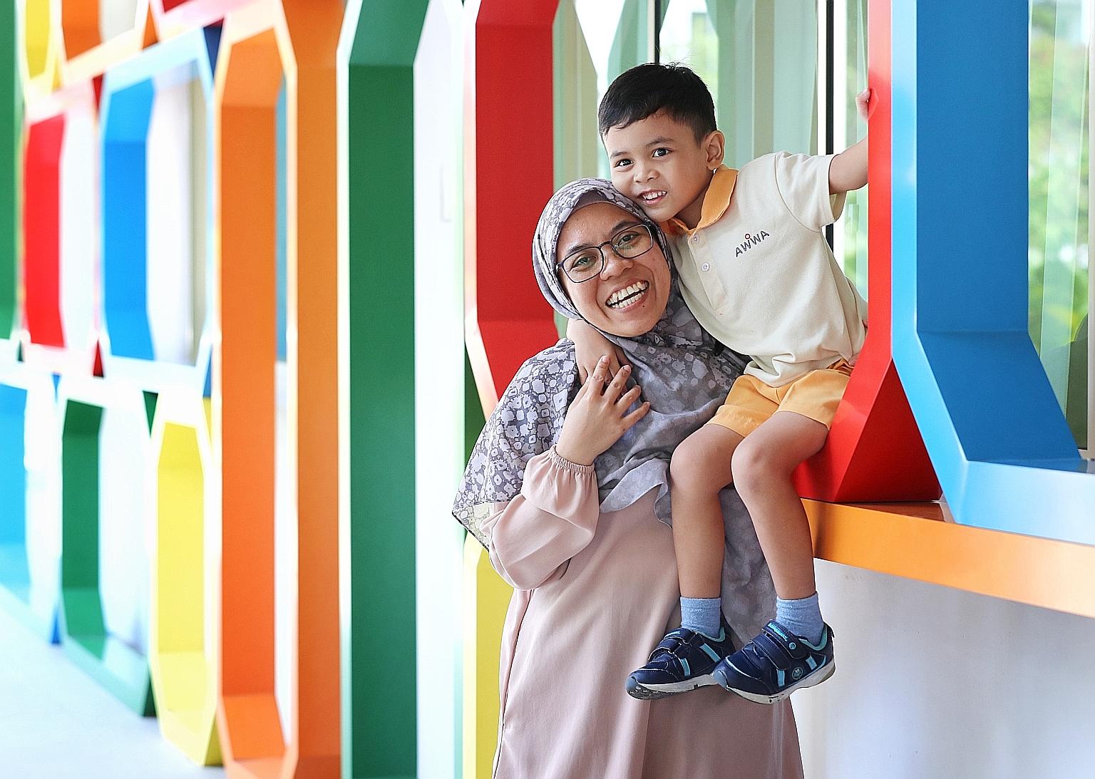 Housewife Shariza Sahari, 42, with her six-year-old son, Aqeel, who has autism. Mother and son go to the Awwa Early Intervention Centre in Fernvale three times a week. At a peer coaching and support session at the centre called Kopi Chat, Madam Shari