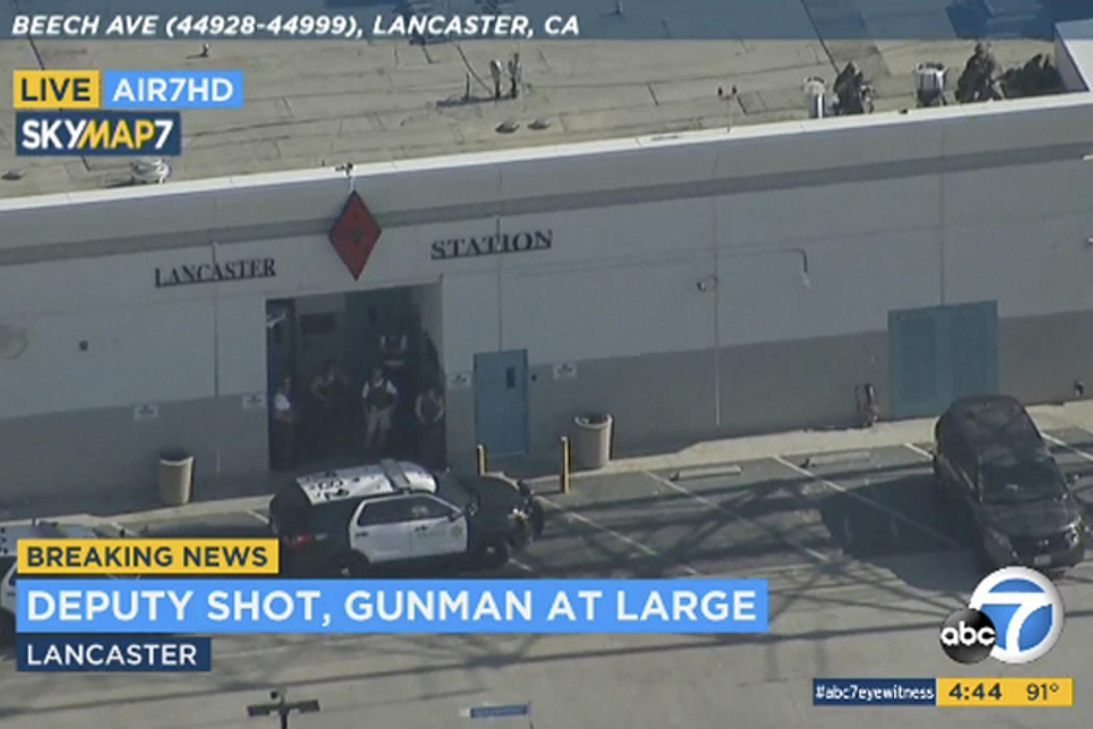 Gunman at large after Los Angeles deputy gets shot at sheriff's station ...