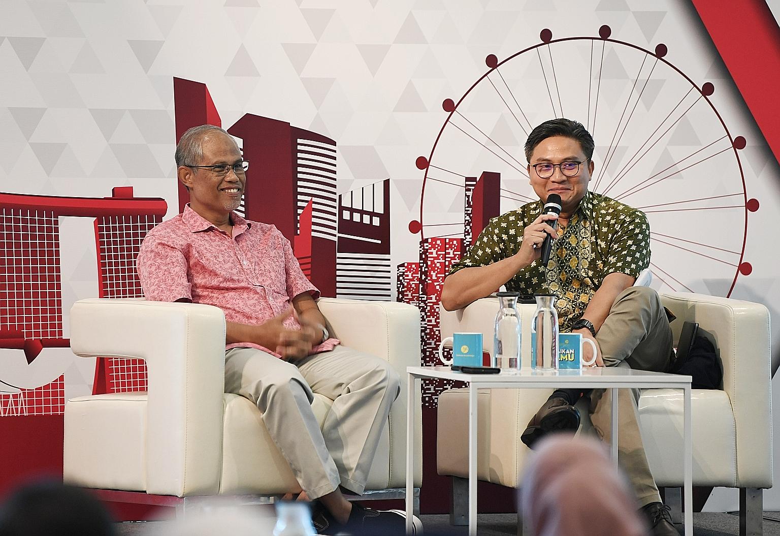 Minister-in-charge of Muslim Affairs Masagos Zulkifli (left) and MP Saktiandi Supaat at the dialogue yesterday.