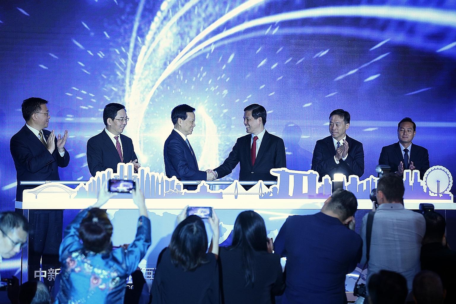 At the launch of the China-Singapore (Chongqing) International Data Channel yesterday were (from left) Vice-Minister of the International Department of the Chinese Communist Party Central Committee Guo Yezhou, Chinese Ambassador to Singapore Hong Xia