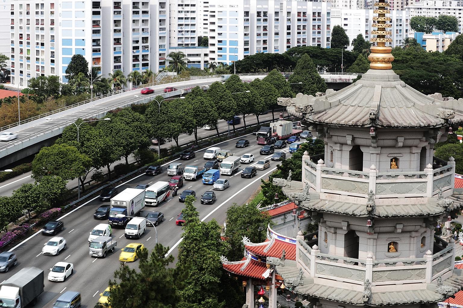 The accident yesterday caused a massive traffic jam that took several hours to clear. A motorcycle, two cars and a lorry, which was towing a truck, were involved in the accident. ST PHOTO: KELVIN CHNG