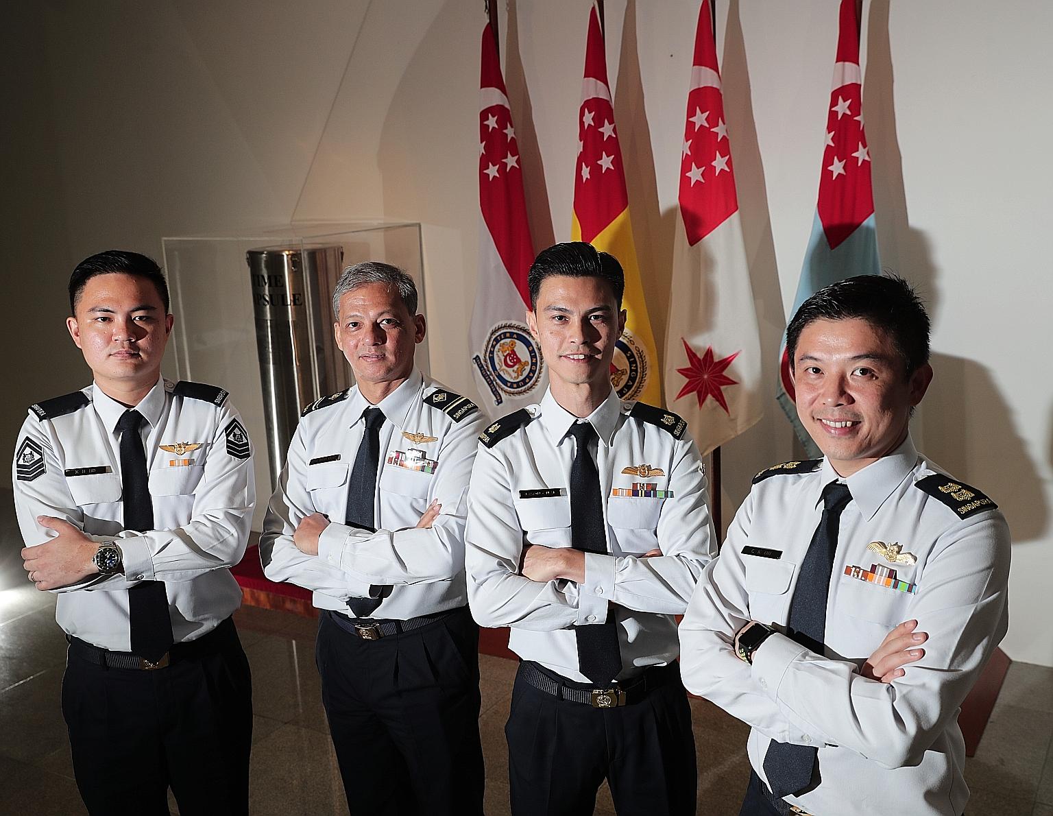 (From left) Staff Sergeant Keith Ho, Military Expert 4 Brian Rezel, Major Jason Chai and Lieutenant-Colonel Oh Chun Keong were among 95 military personnel who received Overseas Service Medals from Defence Minister Ng Eng Hen yesterday. Dr Ng said the