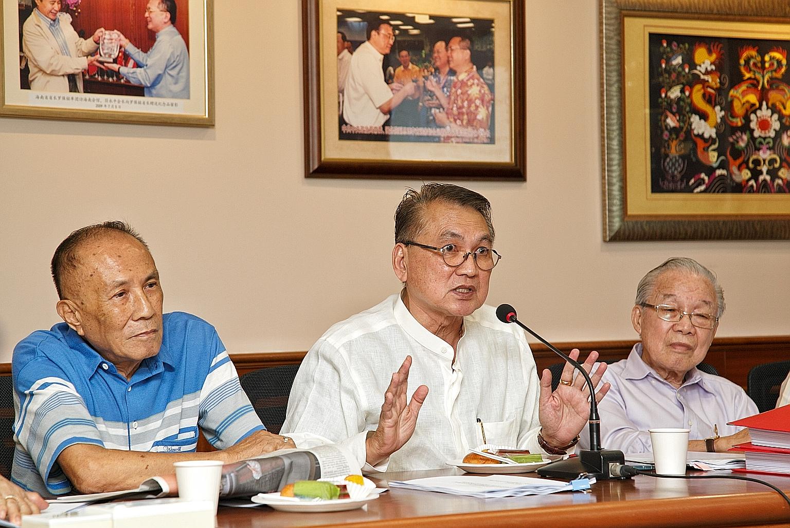 (From left) The Kheng Chiu Tin Hou Kong and Burial Ground's adviser Ngiam Seng Wee, chairman Foo Jong Peng and treasurer Liang Foo Jee at a meeting with reporters yesterday. Mr Foo said he had applied to register the new federation with the Registry 
