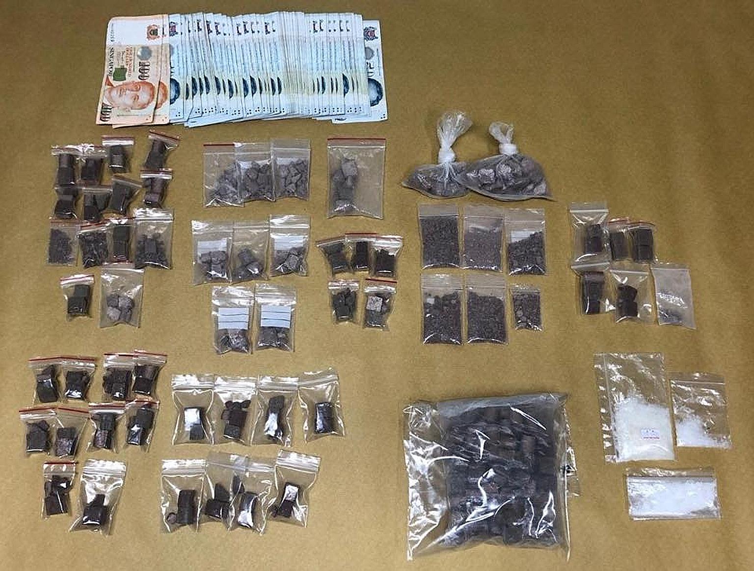 Cash and $78,000 worth of drugs were seized in two Central Narcotics Bureau operations on Thursday. CNB is investigating the drug activities of all the five suspects.