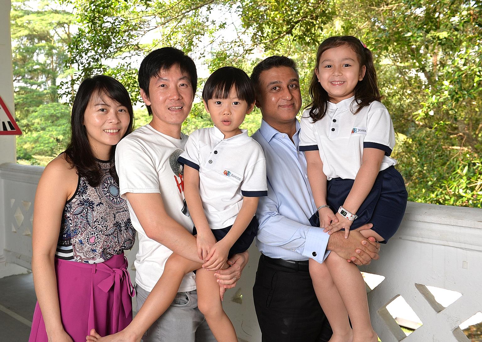 Mrs Emily Wong and Mr Matthew Wong with their five-year-old son Isaiah, along with Mr Sonny Panesar and his six-year-old daughter Akina. Isaiah and Akina attend Gate Junior in Dempsey, a learning centre for children with high IQ. The centre has more 
