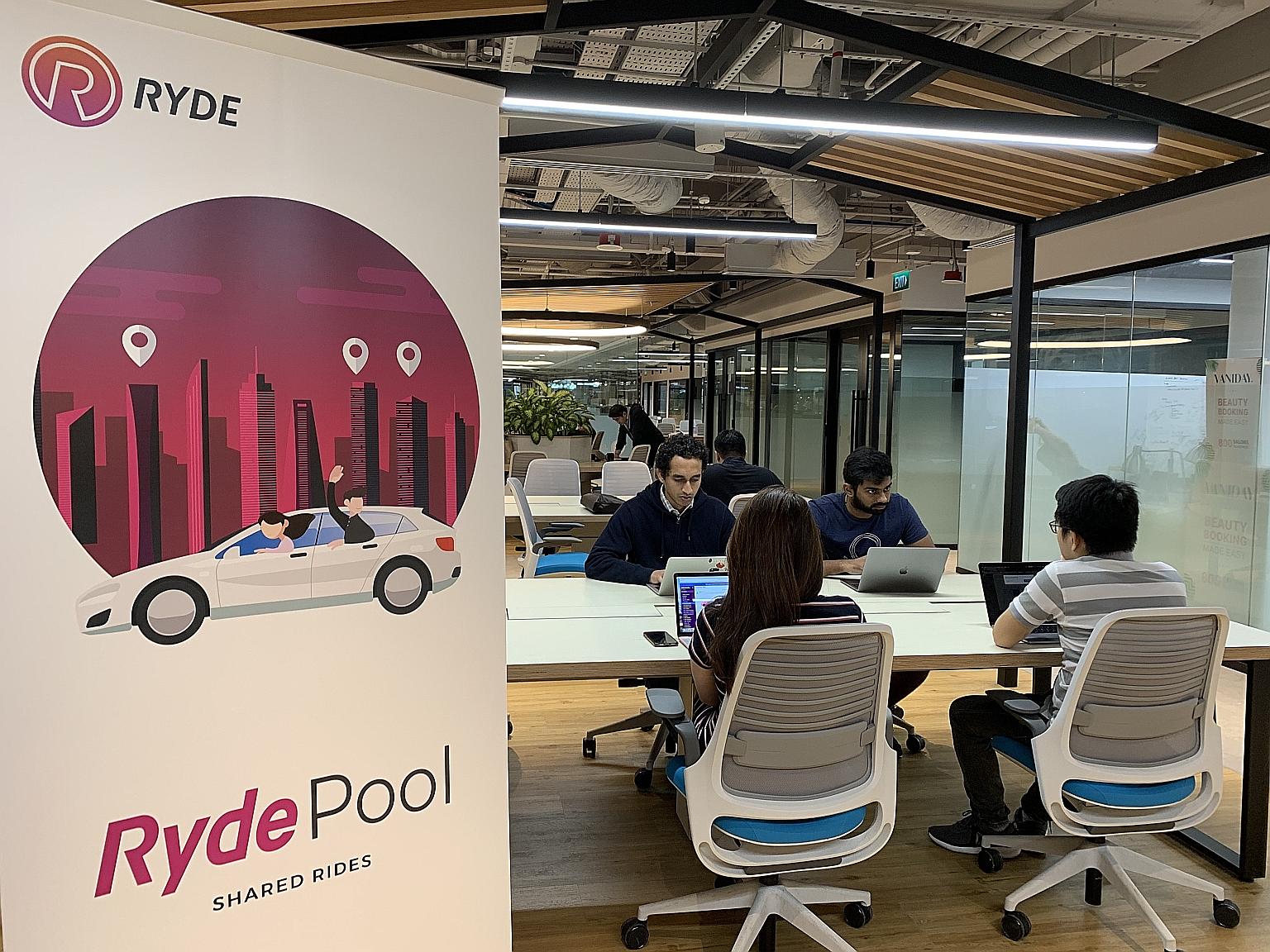 Ryde staff at the firm's office in Marina Square. Ryde founder and chief executive Terence Zou says the partnership with Trans-Cab is expected to benefit both drivers and commuters. He says that with more drivers on the platform, prices will be faire