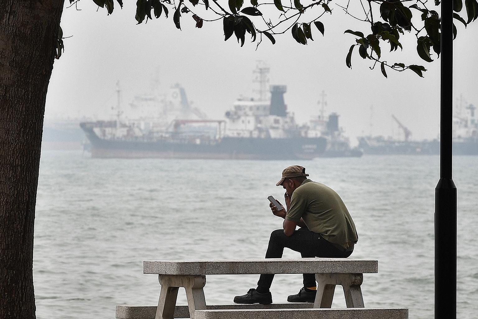 Hazy conditions at East Coast Park on Sept 14, when air quality took a sharp turn for the worse and the 24-hour Pollutant Standards Index reading crossed the unhealthy level for the first time since 2016. ST PHOTO: CHONG JUN LIANG