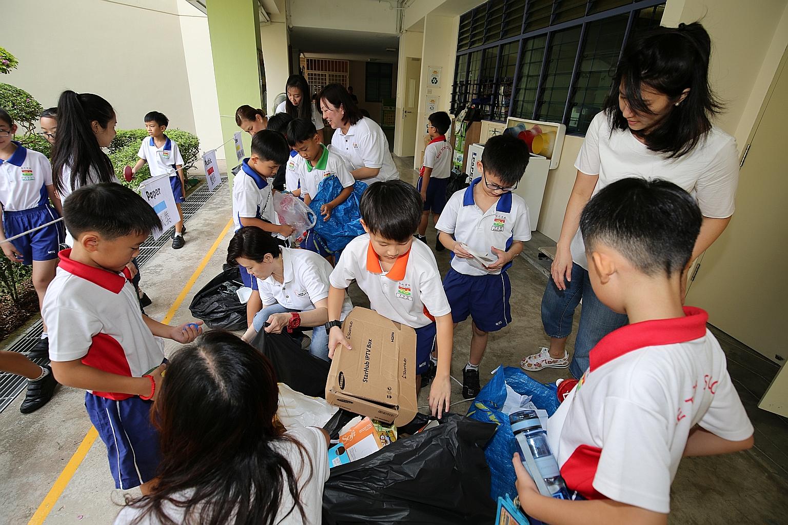 Mee Toh School pupils have been taking recyclables collected at home to the school every Wednesday as part of its recycling programme. The items are weighed and sorted before they are bagged and sent for recycling. The school received the President's