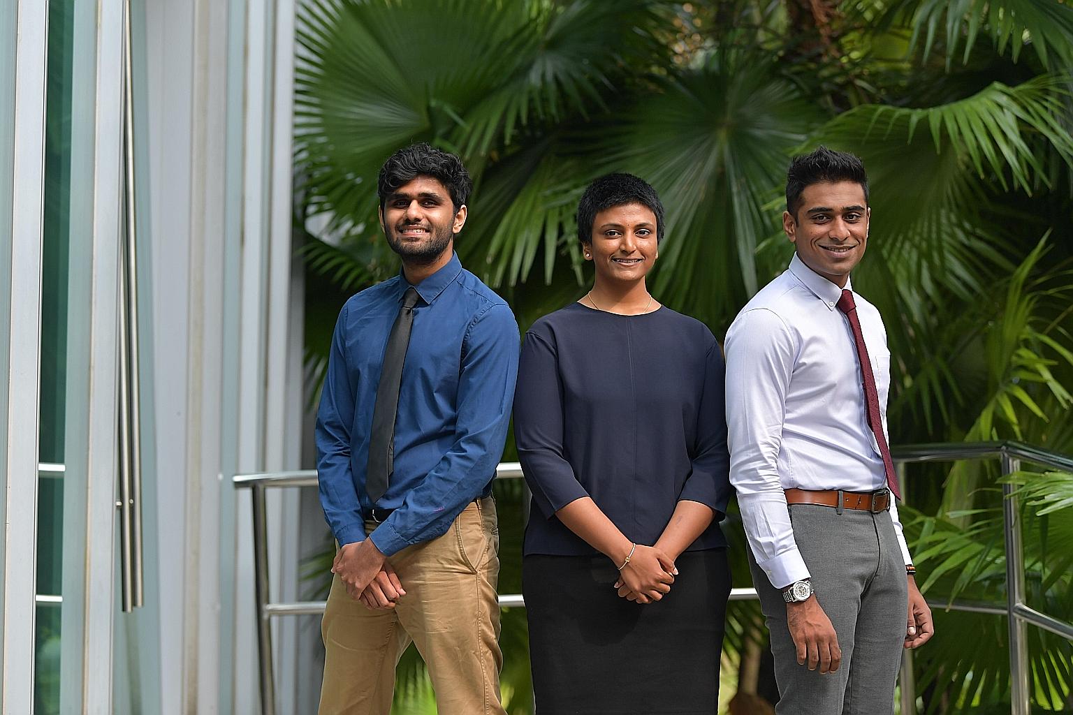 Among those receiving Sinda's Excellence Award yesterday were (from left) Mr Suraendher Kumarr, 25, Ms Angelyn Puspa-Nathan, 21, and Mr Mohamed Nizar Bathushaa Mohamed Hanifah, 24. ST PHOTO: NG SOR LUAN