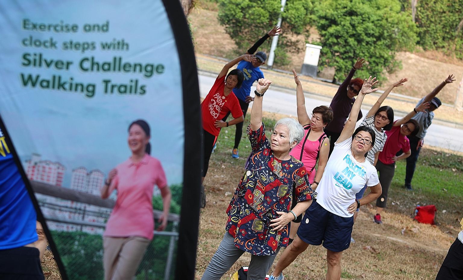 Participants of the Silver Challenge at Tampines Eco Green yesterday. The challenge features walks at iconic locations and nature parks and simple tips on healthy ageing.