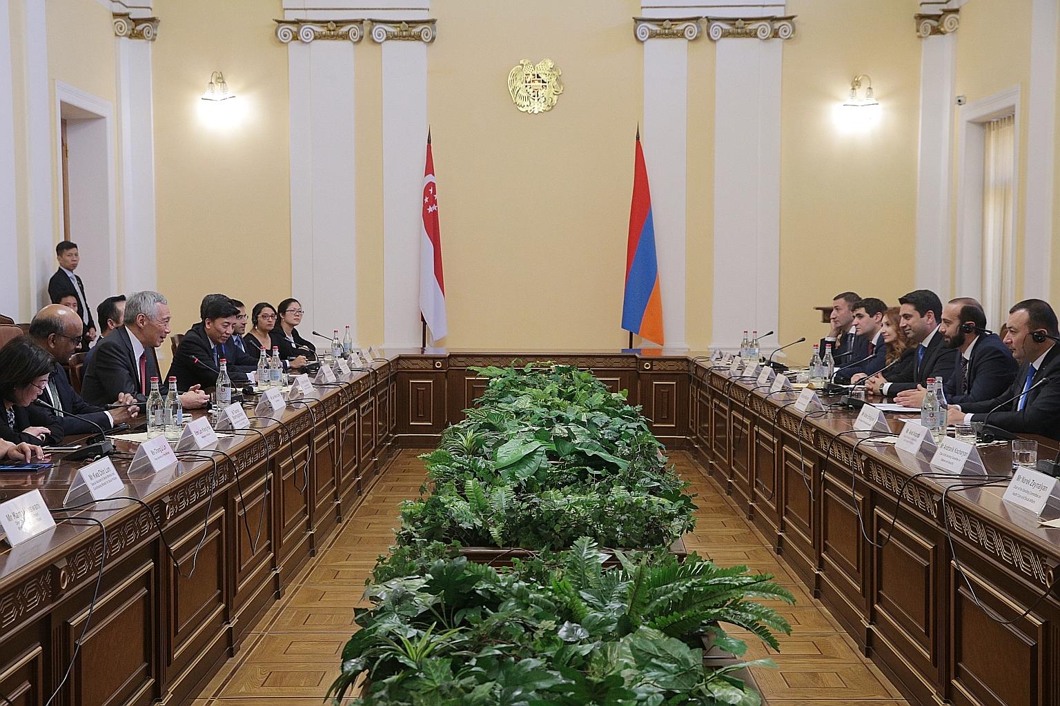 Prime Minister Lee Hsien Loong in a meeting with Armenian National Assembly chairman Ararat Mirzoyan (second from right) in Yerevan yesterday. Both expressed interest in expanding relations, including strengthening parliamentary ties, and also welcom