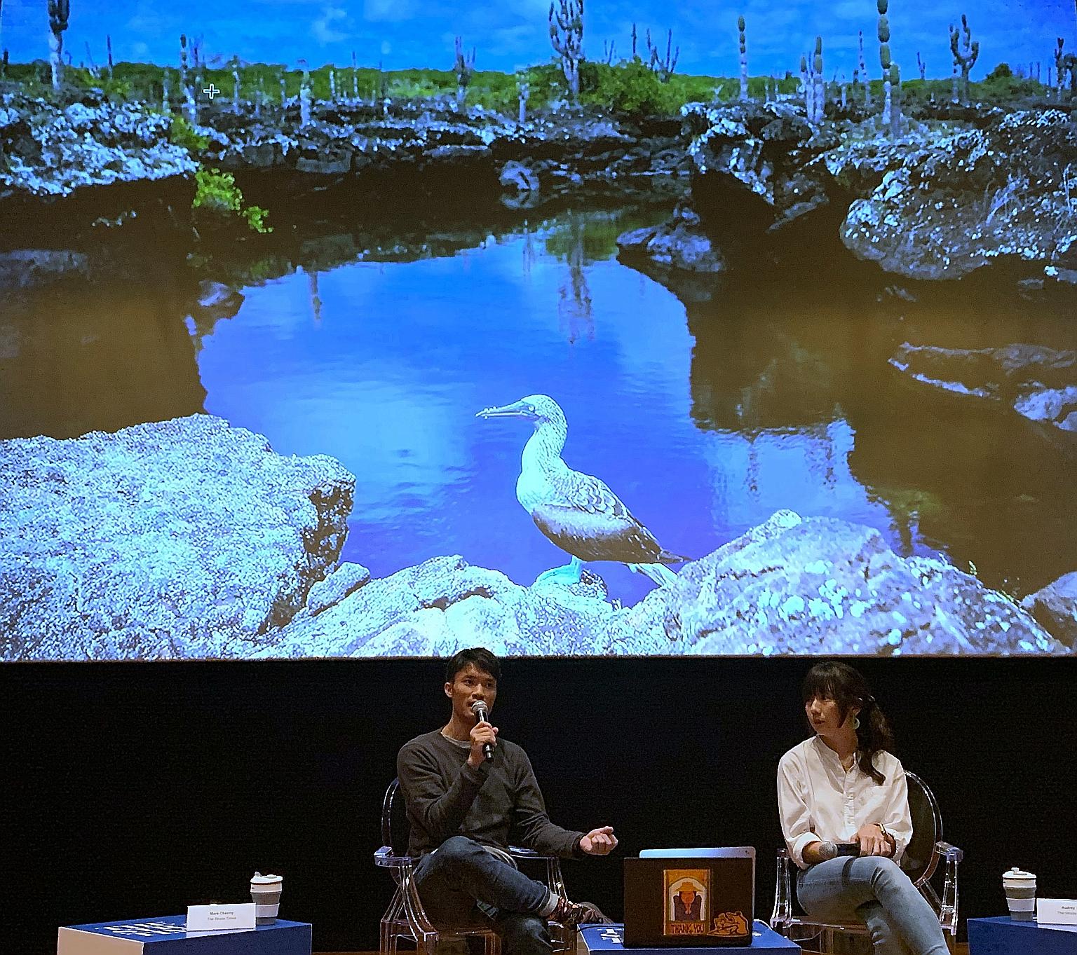 ST executive photojournalist Mark Cheong and environment correspondent Audrey Tan giving a talk yesterday on a climate change special published on June 9.