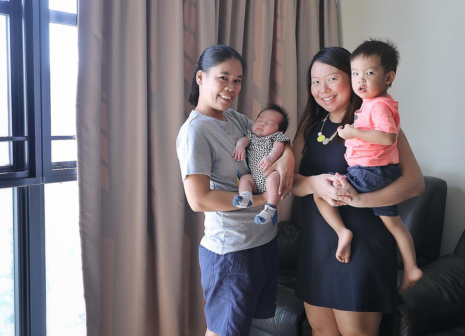 Content strategist Lee Pei Lin, 34, and her domestic helper Andrea Cartel, 38, with Ms Lee's children, Ellie, who is six weeks old, and Ezra, two. Ms Lee, whose agent found a suitable helper to take care of a newborn, welcomed the moves, saying that 