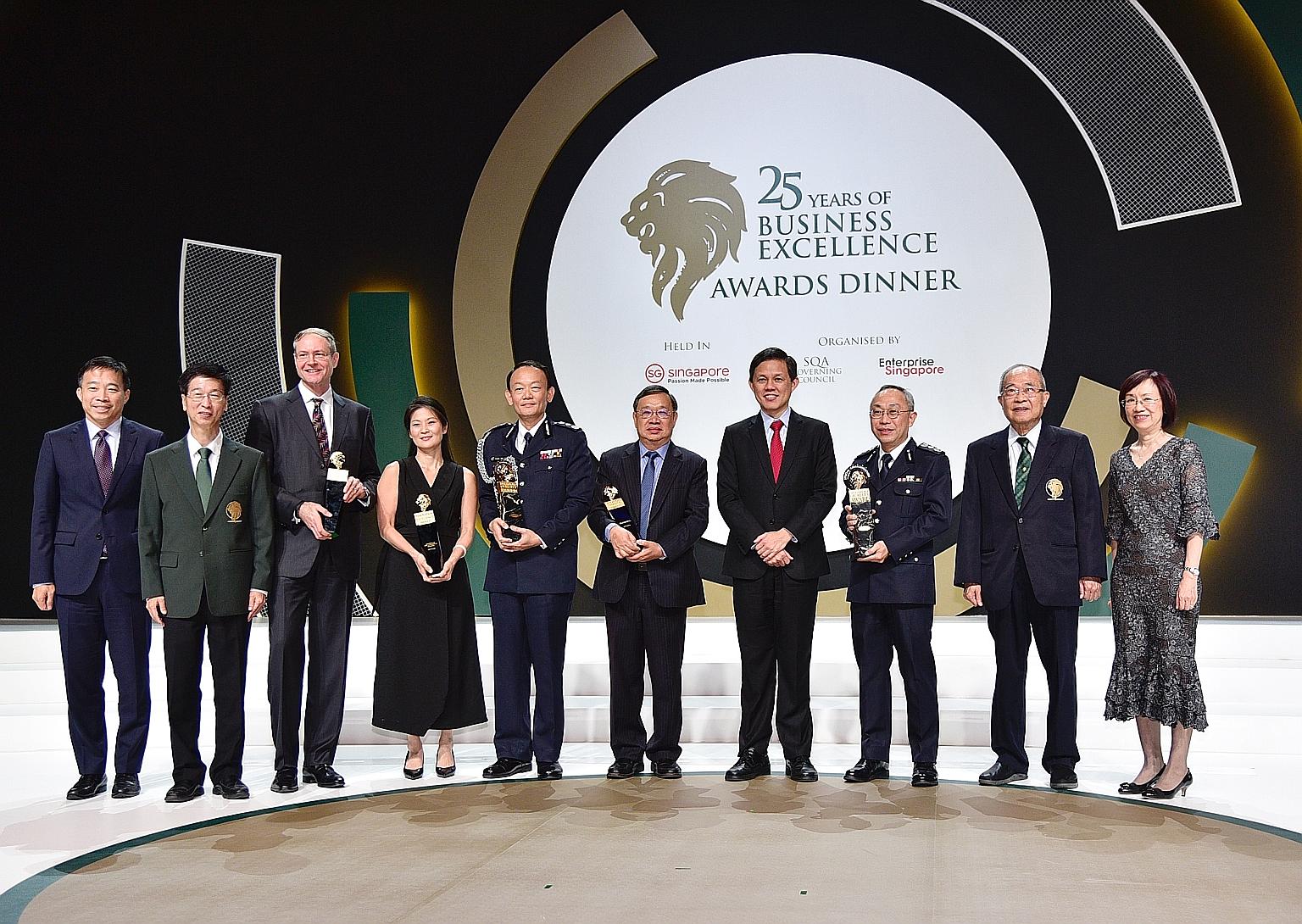 (From left) Enterprise Singapore chief executive Png Cheong Boon; Singapore Quality Award (SQA) management committee chairman Ang Hak Seng; Mr Ian Wilson, senior vice-president, non-gaming operations, Marina Bay Sands; Maritime and Port Authority of 