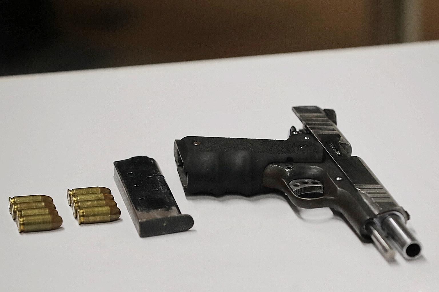 The firearm, believed to be a Seahawk pistol, and eight rounds were recovered after a man suspected of illicit drug activities led the authorities to the Housing Board flat. This is understood to be the first case involving the illegal possession of 