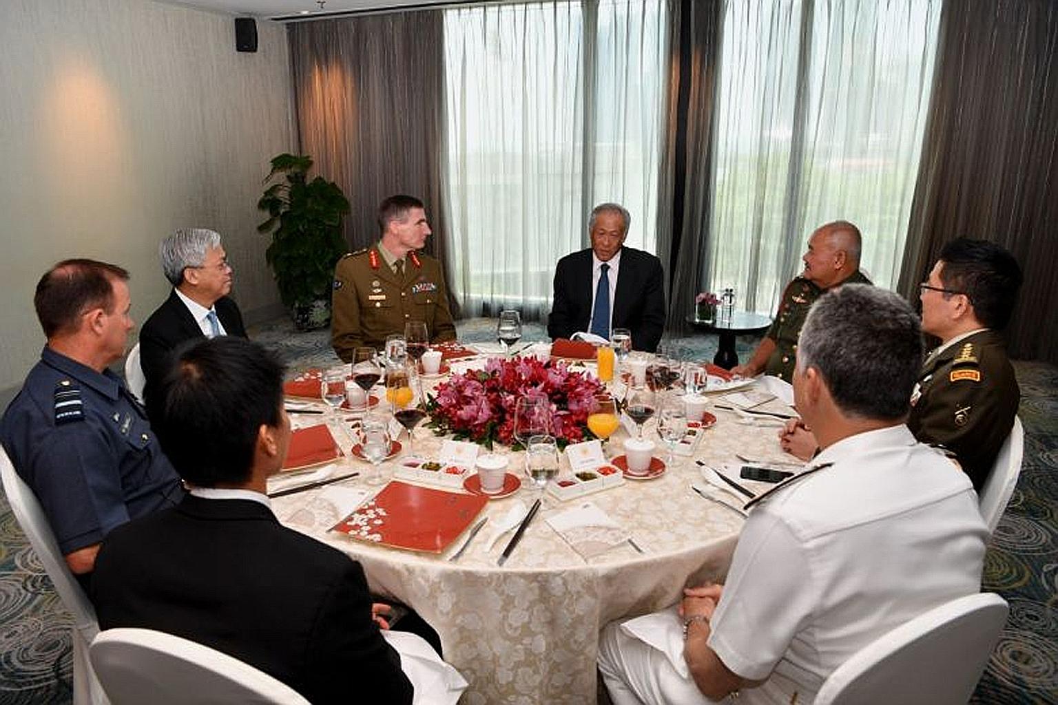 Minister for Defence Ng Eng Hen hosting a lunch for the defence chiefs of the Five Power Defence Arrangements (FPDA) member-nations yesterday. The military chiefs of Singapore, Malaysia, Australia, New Zealand and Britain were attending an FPDA confe