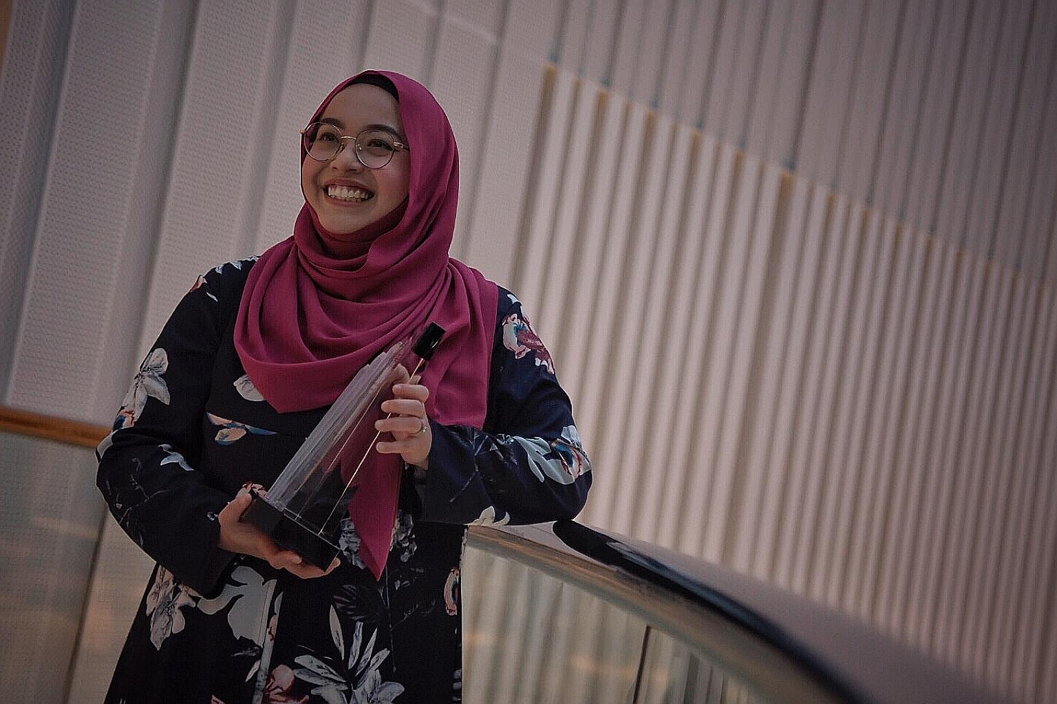 SMRT fleets and assets supervisor Ulfah Khairiah Aman yesterday received the National Service Advocate Award, the highest accolade for those who have gone the extra mile to support Singapore's defence.