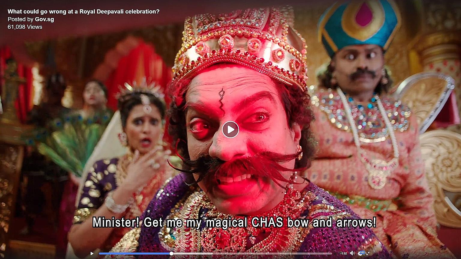 In a screengrab of one of the videos, a king is seen ordering his staff to get his "magical Chas bow and arrows", referring to the Community Health Assist Scheme. PHOTO: GOV.SG/FACEBOOK