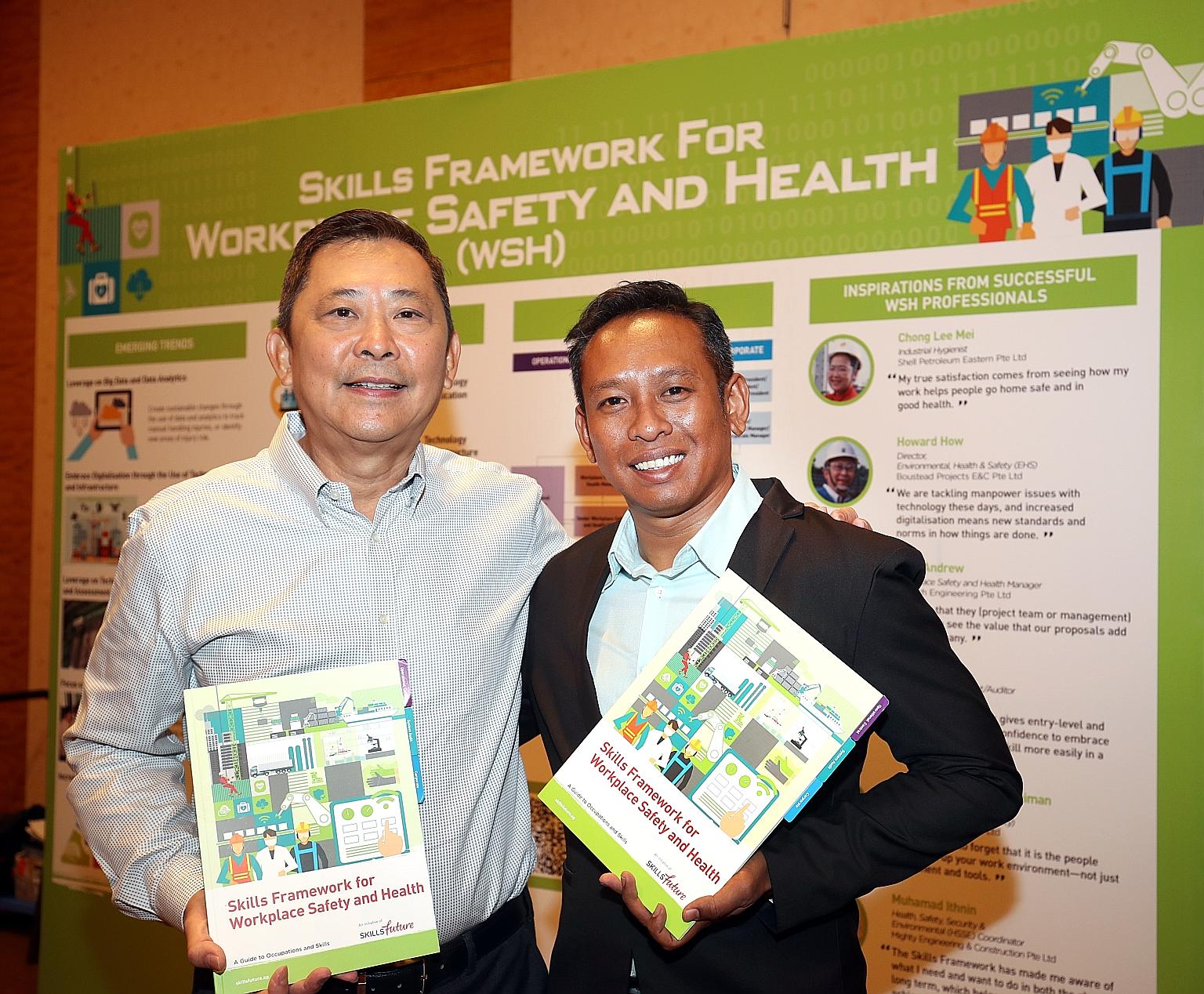 Workplace safety and health director Howard How (left) and health, safety, security and environmental coordinator Muhamad Ithnin are among those who welcomed the new Skills Framework for Workplace Safety and Health, which was announced yesterday.