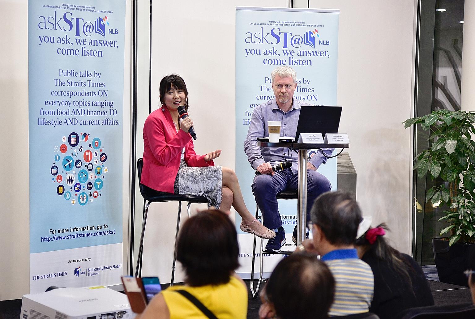 Straits Times environment correspondent Audrey Tan and climate change editor David Fogarty at the askST@NLB session last Friday. ST PHOTO: DESMOND WEE