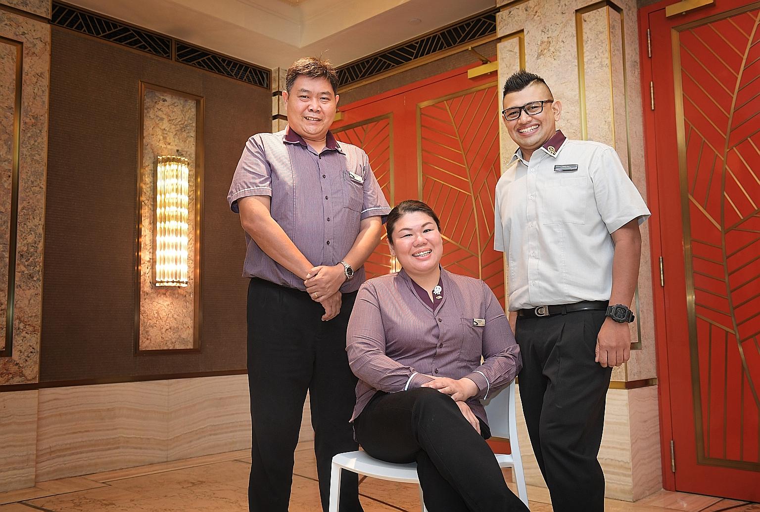 From left: SBS Transit bus drivers Ang Eng Huat and Lee Yee Ching, and assistant station manager Abdul Azim Abdul Azizam were honoured last week for their acts of kindness. ST PHOTO: ALPHONSUS CHERN