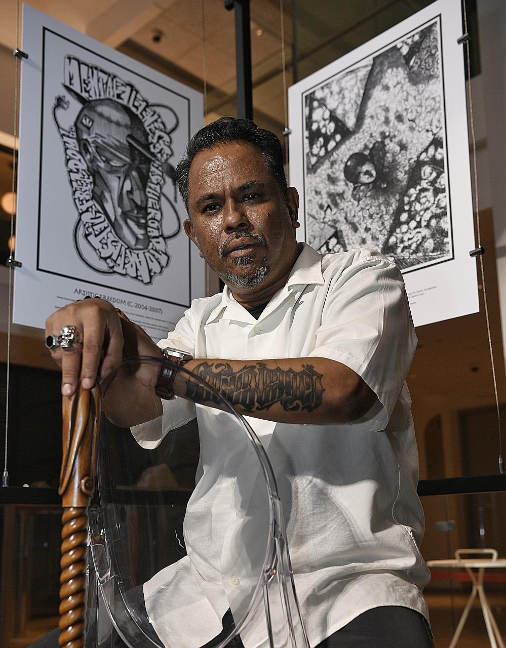 Mr Daren Lauchengco with some of his work at the One Of Us art exhibition at Temasek Shophouse. He is among three artists - all of whom have battled mental health issues - whose works are featured there.