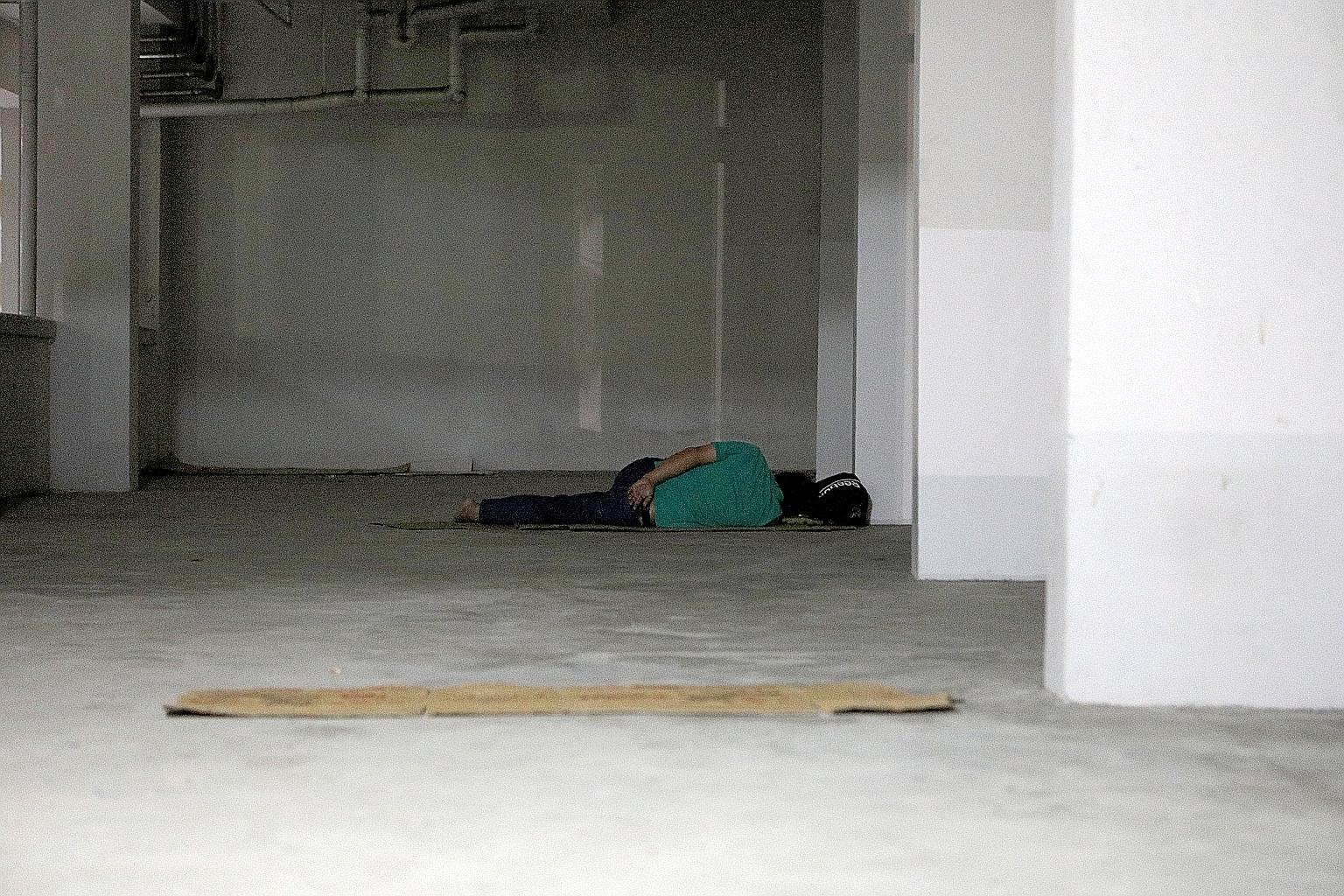Half of the homeless had been toughing it out on the streets for between one and five years, and nearly one-third did so for six years or longer. They slept in places like void decks, commercial buildings and playgrounds. ST PHOTO: WANG HUI FEN
