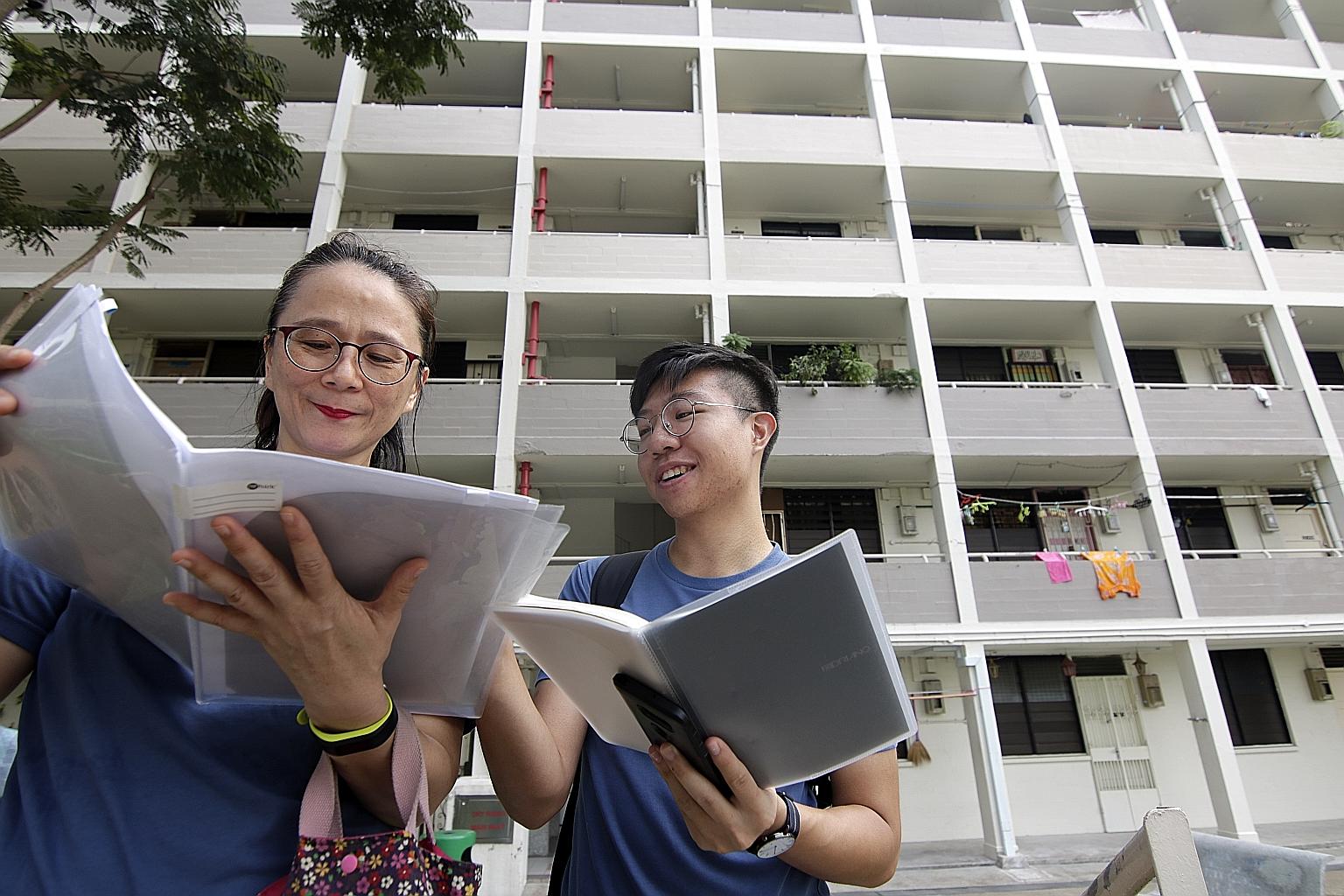 Architecture researcher Jeremy John Kum, 24, and volunteer guide Betty Huang, 52, from civic group My Community, which produced a heritage assessment report on the homes in Stirling Road. The 34-page report has been submitted to the Urban Redevelopme