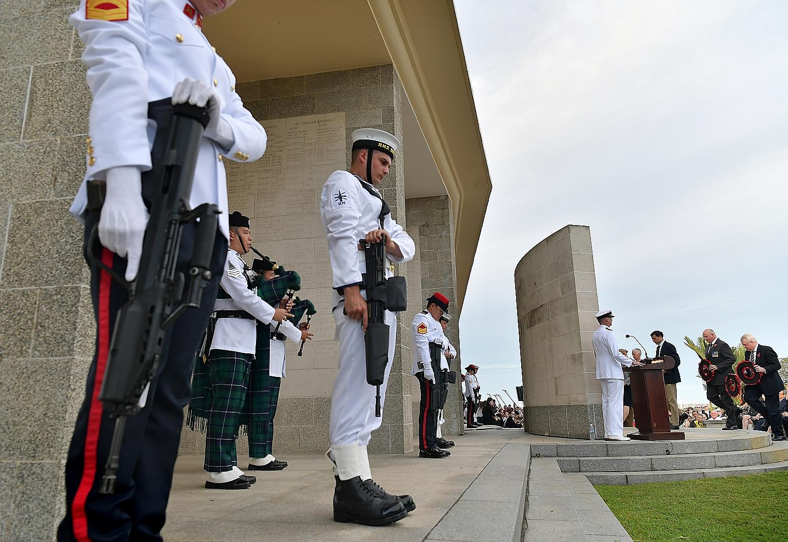 Members of the diplomatic corps, religious leaders and representatives of Singapore and foreign military groups were among those who attended the annual Remembrance Day service at the Kranji War Cemetery yesterday, which saw poppy wreaths (at right)