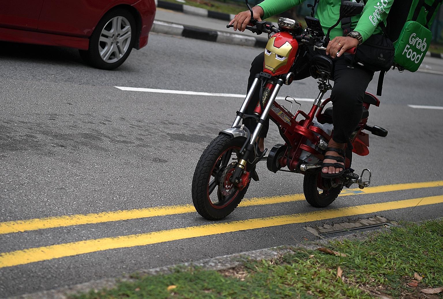 The scheme to help food delivery riders switch from e-scooters to electric bicycles, personal mobility aids or bicycles may increase demand for e-bikes, but retailers say more stocks may come in only from next January. ST PHOTO: KUA CHEE SIONG