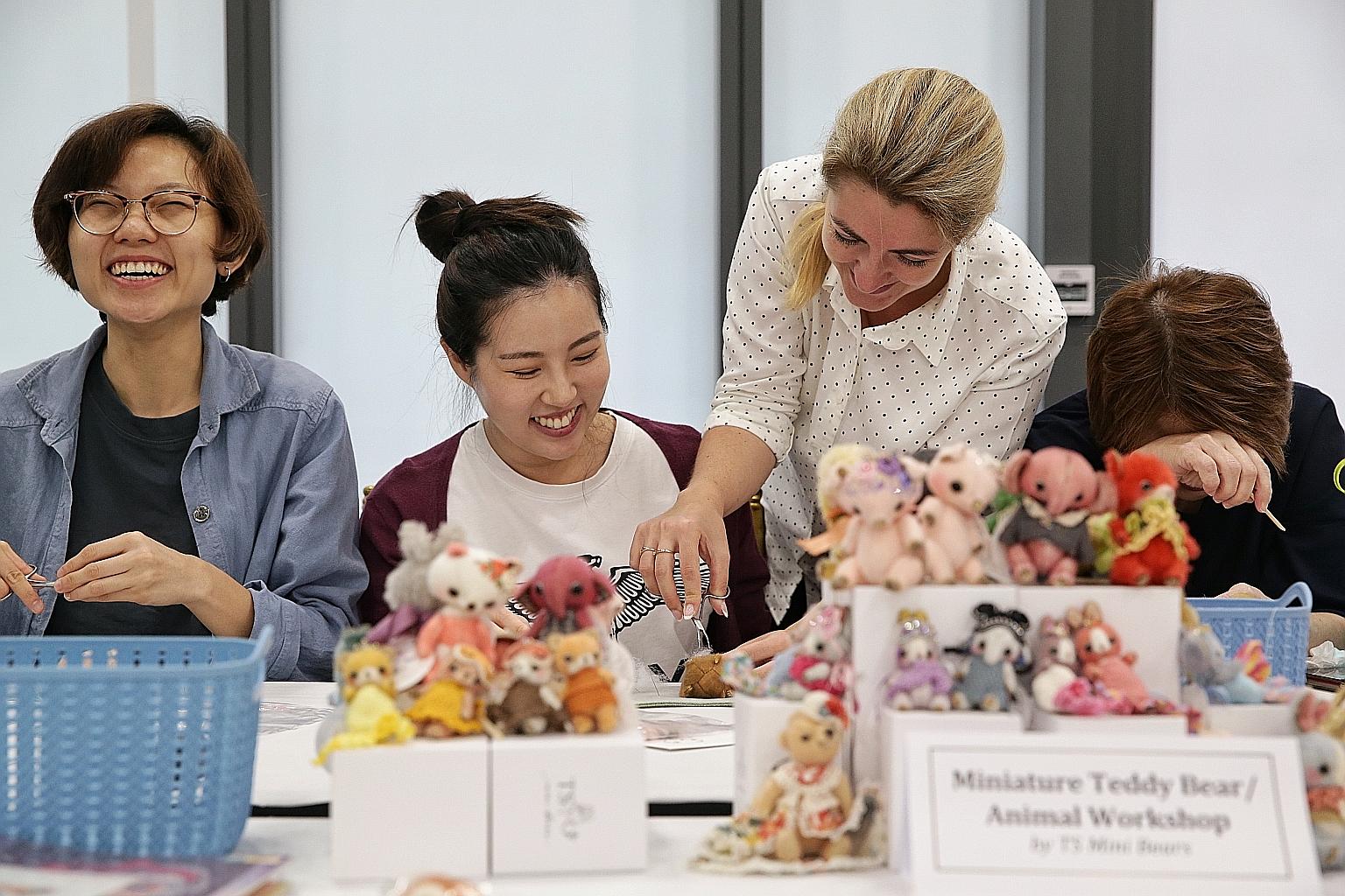 Ukrainian bear artist Tatiana Scalozub (third from left) of TS Mini Bears with participants during her miniature teddy bear and animal workshop last Saturday.