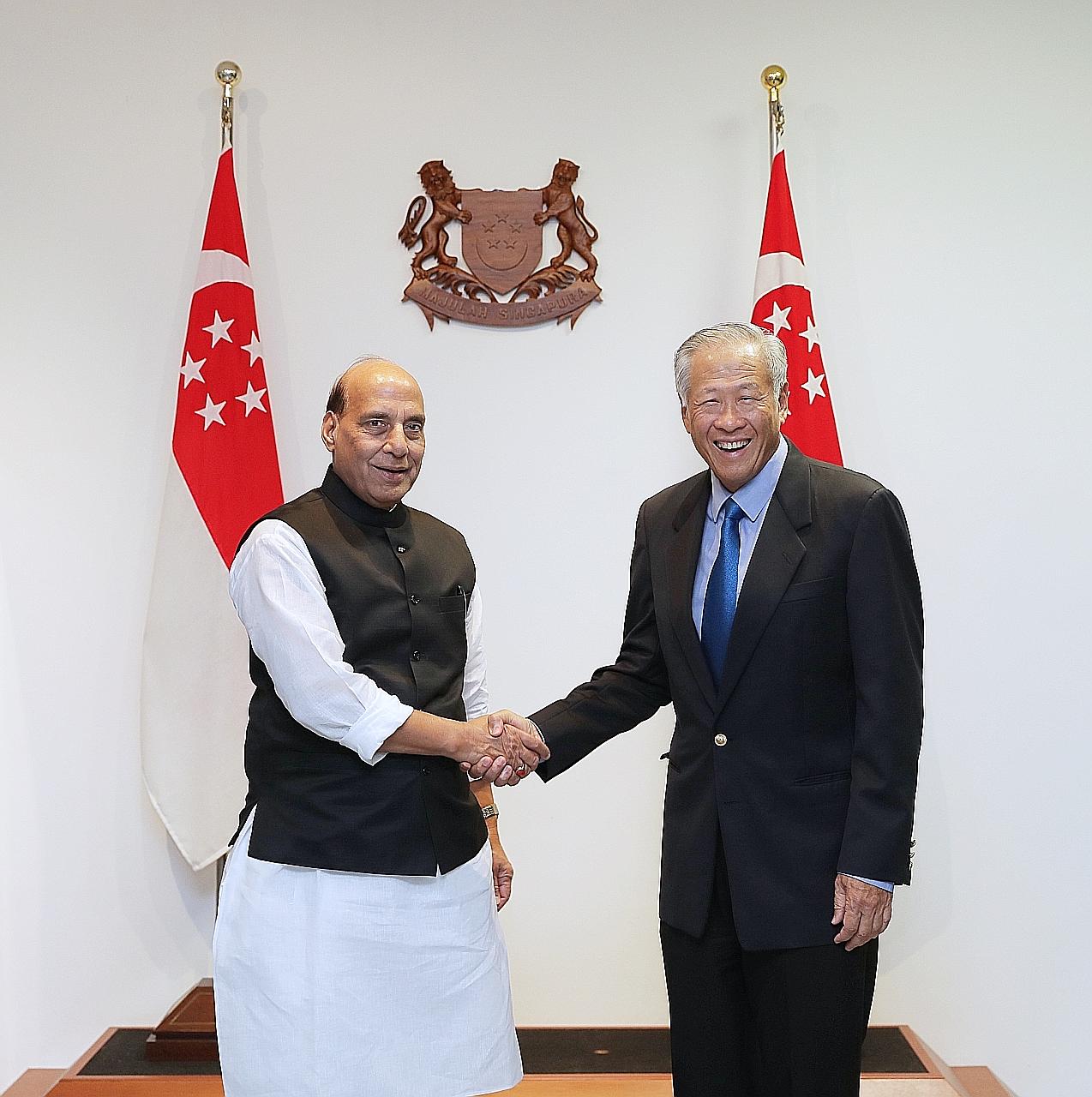 Defence Minister Ng Eng Hen with his Indian counterpart Rajnath Singh at the Ministry of Defence yesterday. Mr Singh said he was confident that both countries will enter a new era of defence partnership.