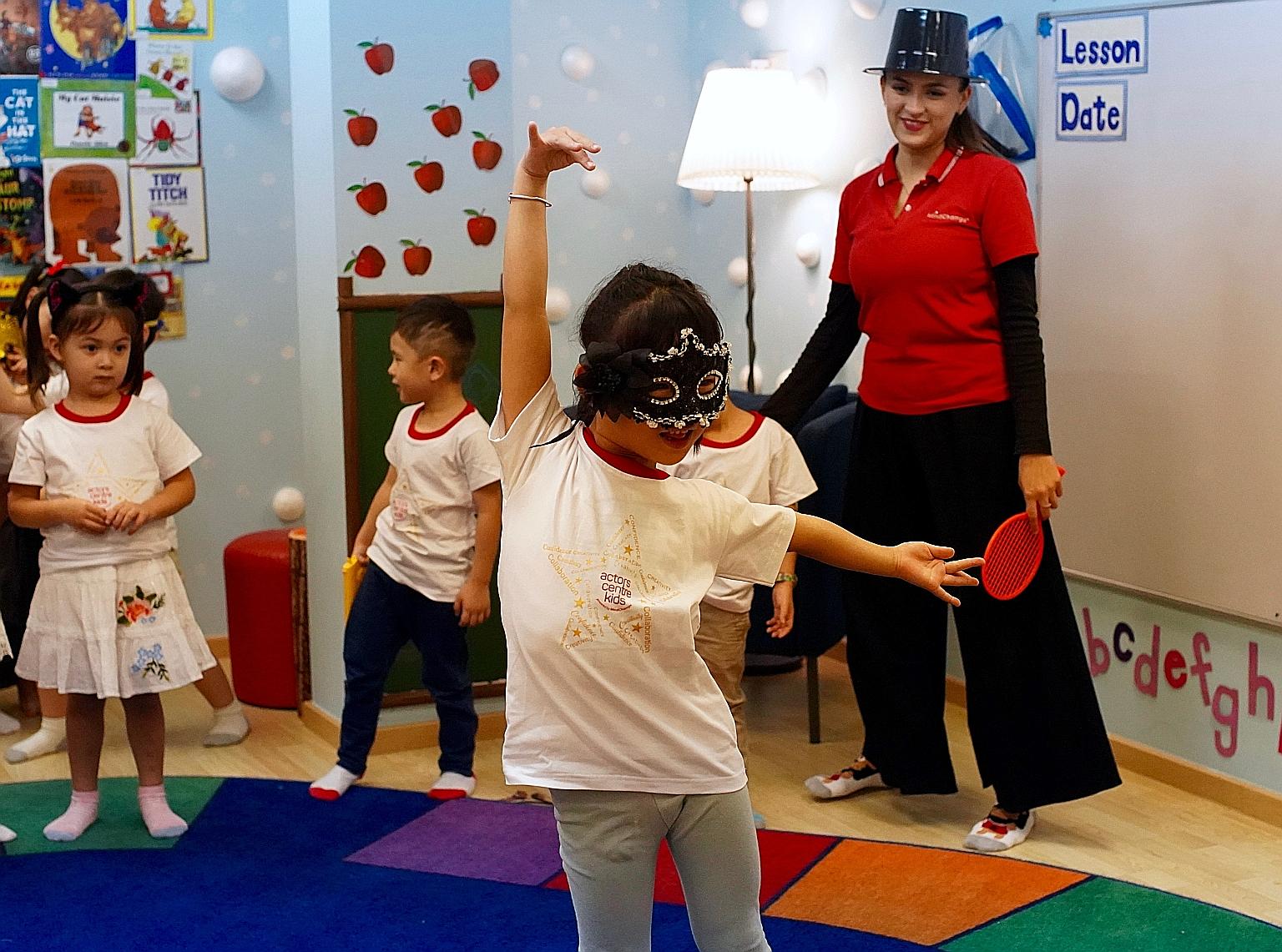 Children taking part in theatre activities at the MindChamps centre in Toa Payoh. The early education provider, which runs 39 pre-schools in Singapore, is opening a new pre-school for the performing arts in Orchard Road from April. It is collaboratin