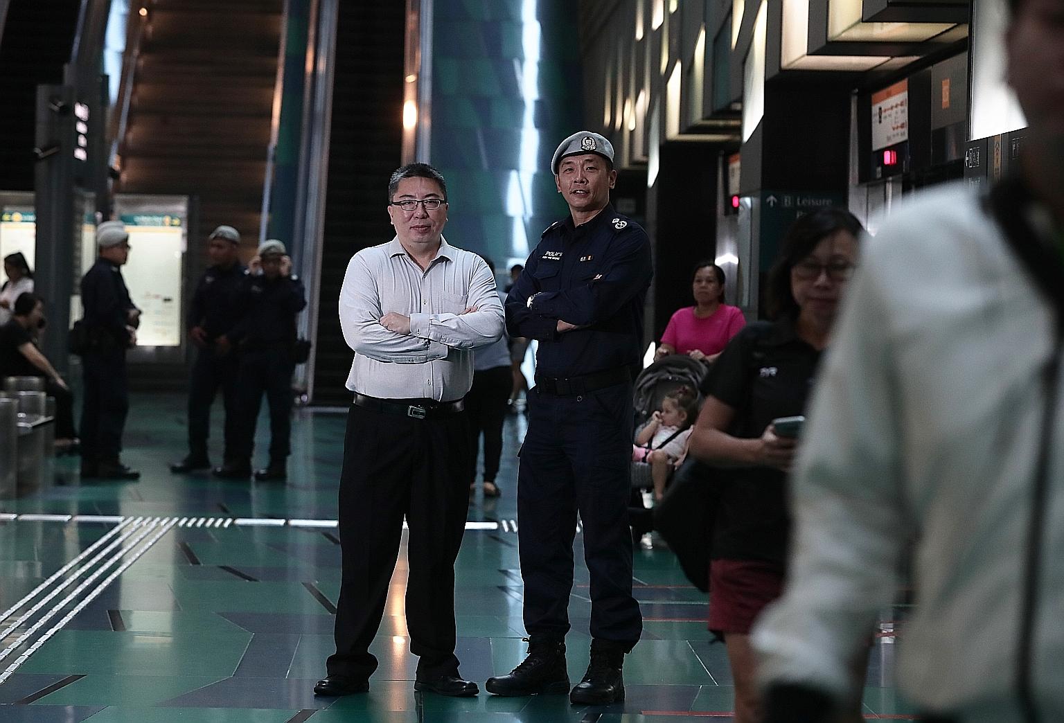 Mr Andy Tan (left) was the first commander of the Public Transport Security Command unit when it was set up 10 years ago to ensure the security of Singapore's mass rapid transit system. With him is Assistant Commissioner Koh Wei Keong, the unit's cur