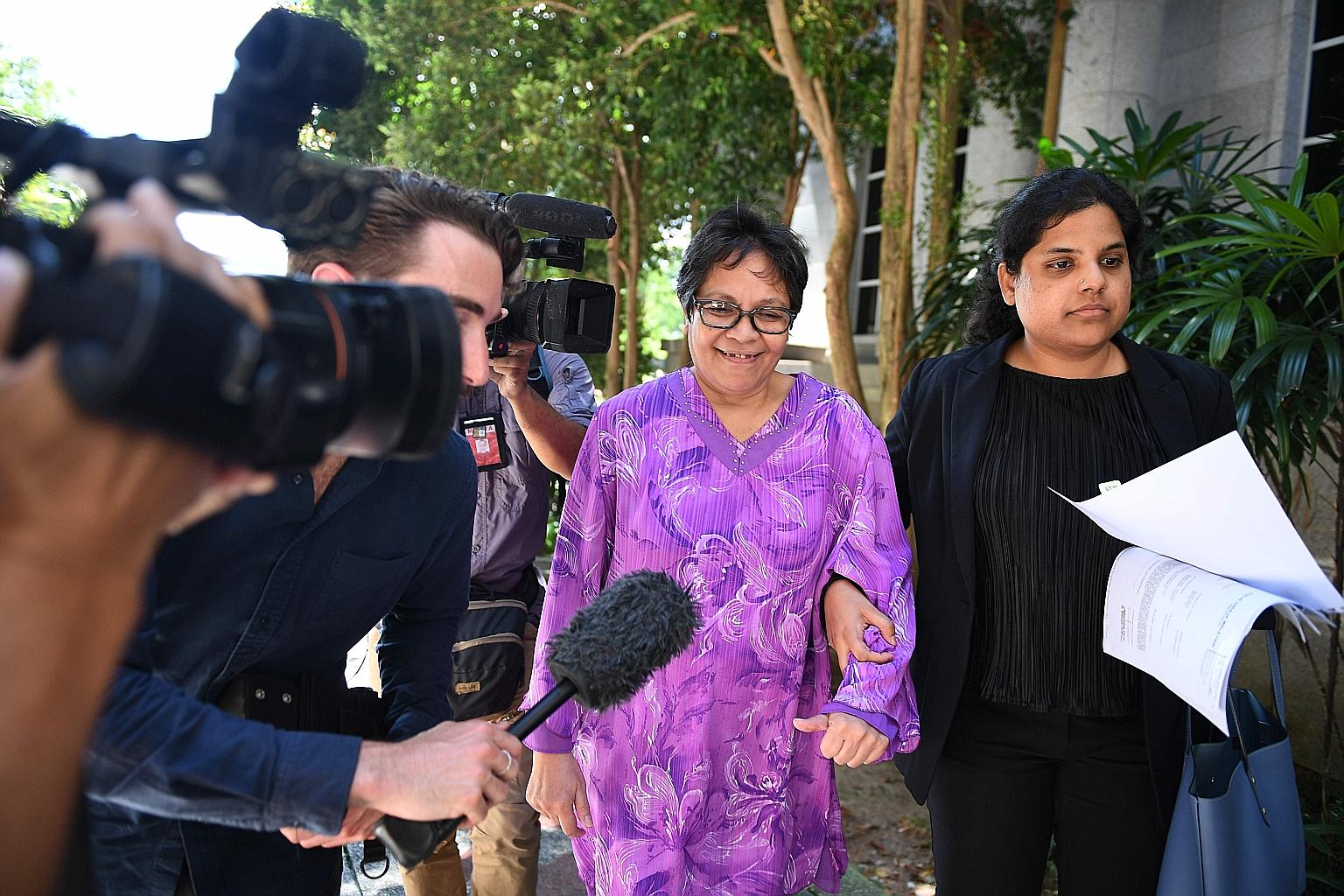 Ms Maria Elvira Pinto Exposto leaving the courthouse after winning her final appeal against a death sentence for drug trafficking at the Federal Court in Putrajaya yesterday. She had claimed she fell for an online love scam and was tricked into trans