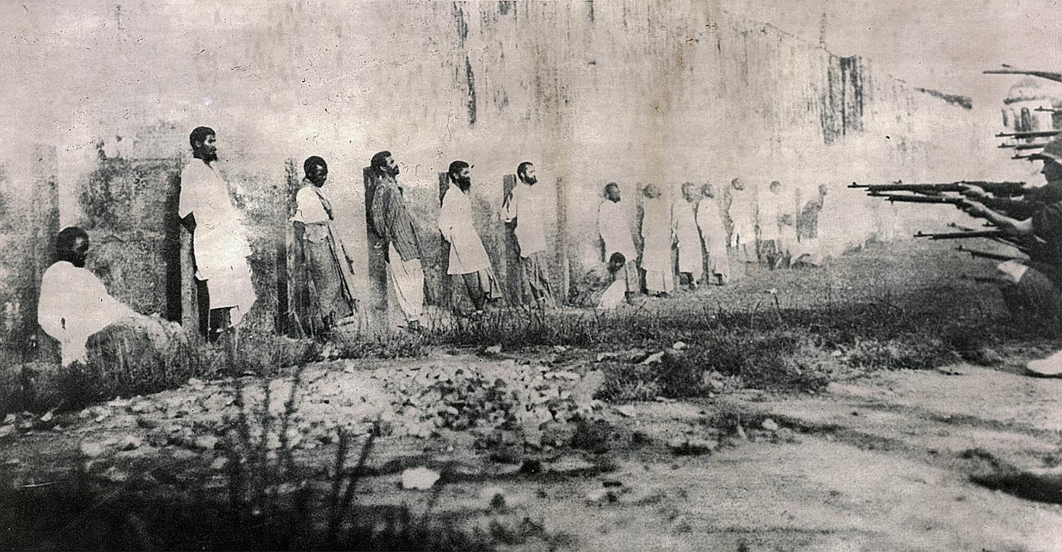 Some mutineers being executed outside Outram Road Prison after the revolt in 1915 by more than 400 sepoys - Indian soldiers under British employ - stationed in Singapore. The mutiny led to 44 British soldiers and civilians killed, and five deaths in 