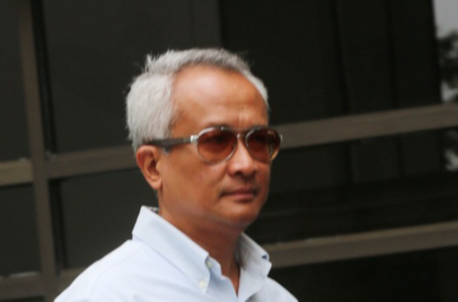 Conveyancing lawyer Mohammed Lutfi Hussin is among the 10 charged over the scam involving nearly $11.4 million.