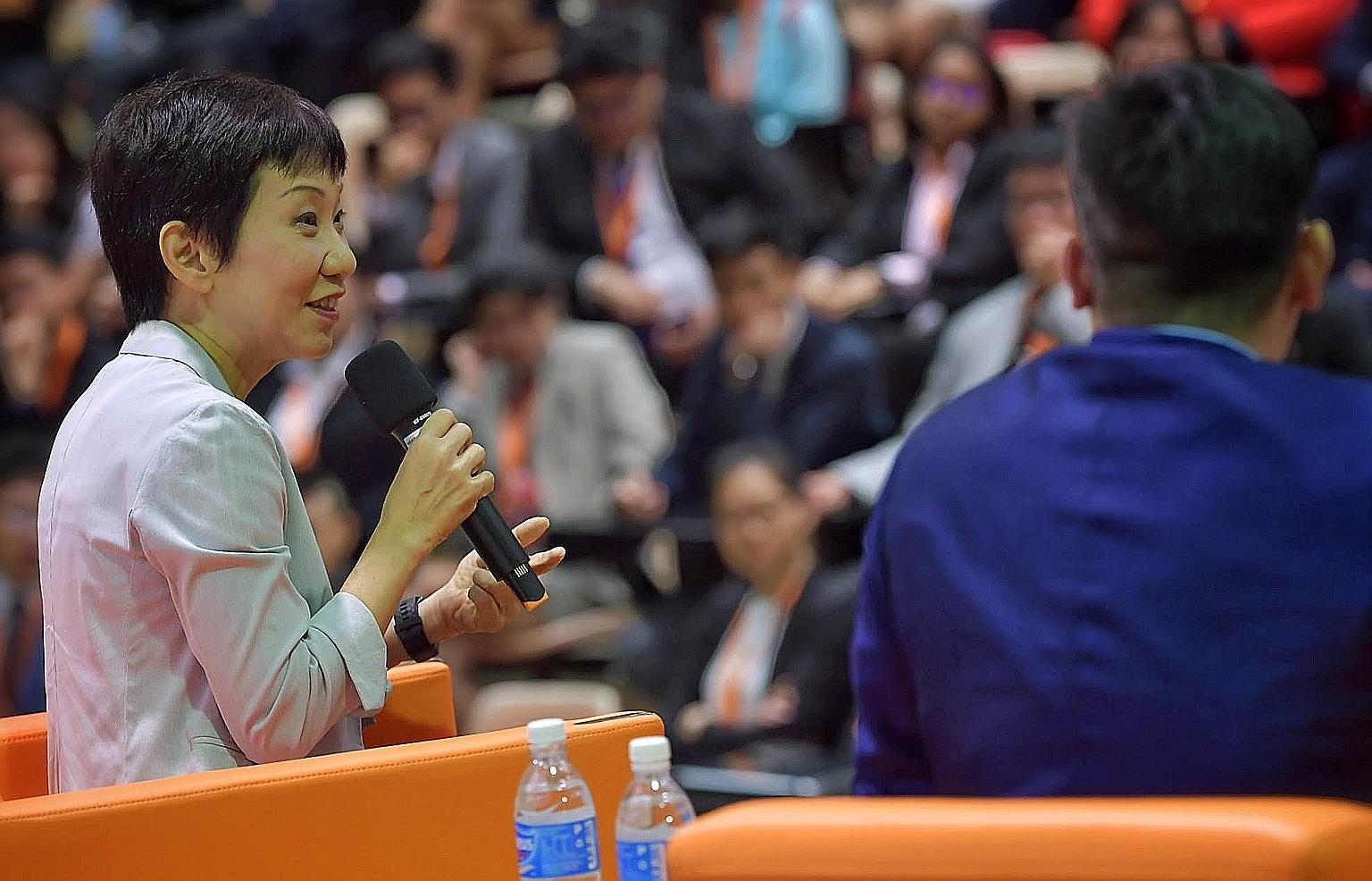 Minister for Culture, Community and Youth Grace Fu speaking to students at a dialogue on race relations during the OnePeople.sg Model United Nations opening ceremony at Yishun Innova Junior College yesterday.