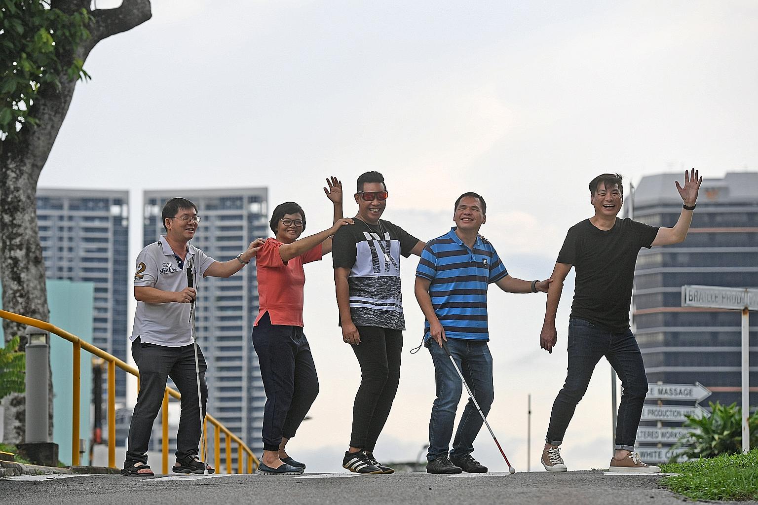 (From right) Singapore Association of the Visually Handicapped (SAVH) executive director Joshua Chegne with Mr Edwin Khoo, Mr Iskandar Ibrahim, Ms Ong Mei Ching and Mr Chong Kwek Bin. Mr Chong and Mr Khoo are SAVH staff, while Ms Ong and Mr Iskandar are c