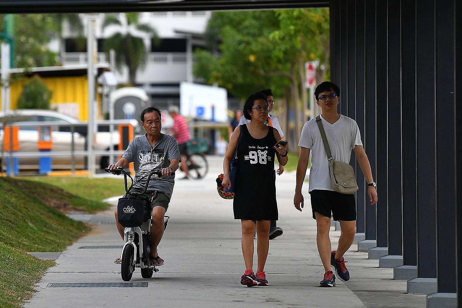 The LTA said it will step up patrols to strictly enforce the zero-tolerance policy towards riding e-scooters on footpaths. The number of registered e-scooters has also gone down to 75,000 in the wake of the ban. ST PHOTO: LIM YAOHUI