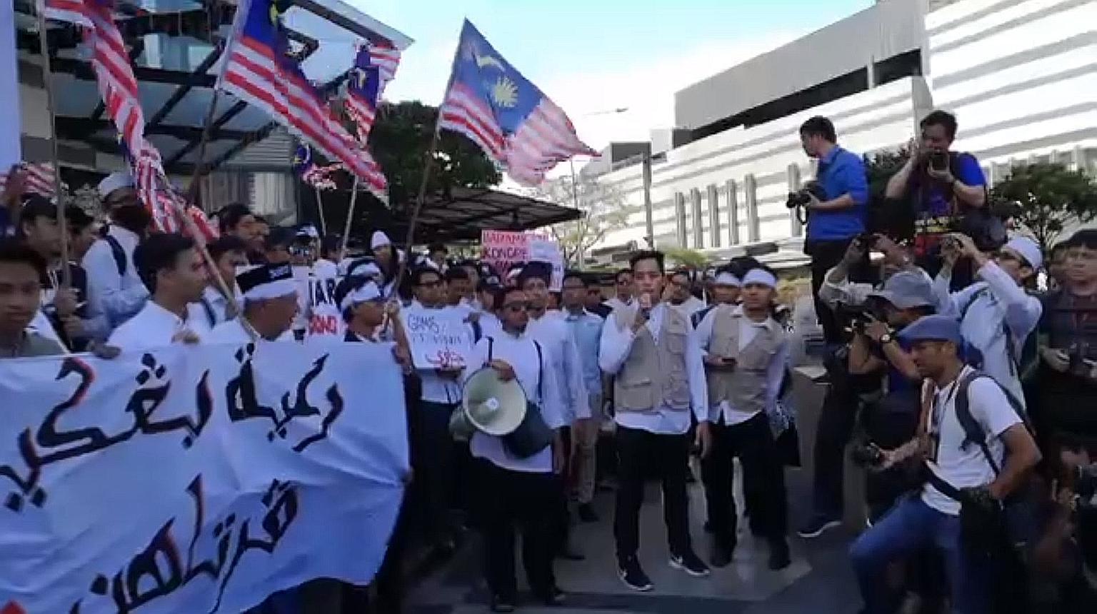Organised by the Malaysian Muslim Students Coalition (Gamis), the peaceful gathering yesterday was held despite a police warning that the organiser had failed to obtain a permit for the march. PHOTO: GAMISMALAYSIA/FACEBOOK
