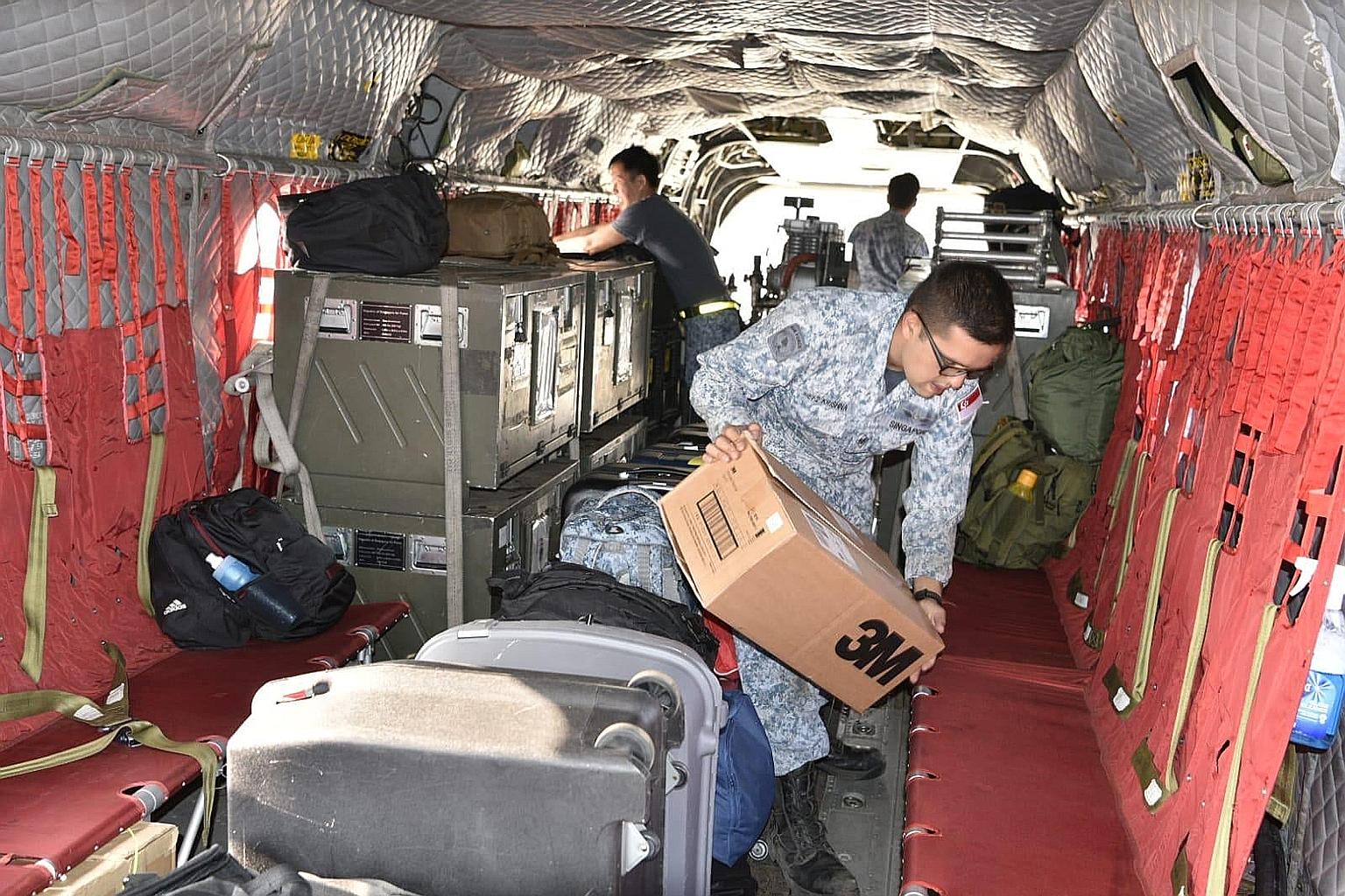 RSAF personnel loading firefighting and relief supplies onto a Chinook bound for Royal Australian Air Force Base East Sale in Victoria state. Singapore's Defence Minister Ng Eng Hen said Australia's bush fires have already destroyed more than 6 milli