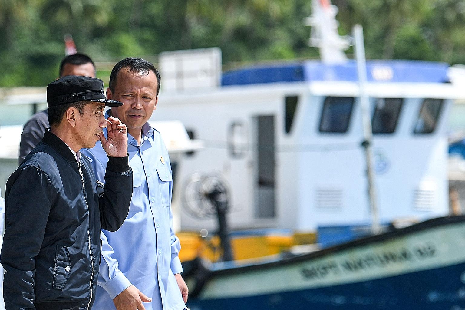 Indonesia's President Joko Widodo with Maritime Affairs and Fisheries Minister Edhy Prabowo during a visit to the Natuna Islands on Wednesday, after reports of alleged intrusion by Chinese vessels last month.