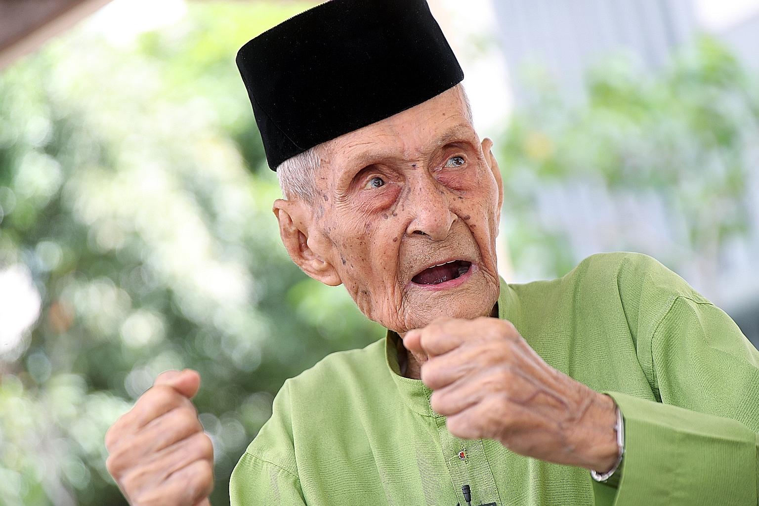 Above: Mr Yusof Mohammad served in the police force from 1946 to 1968. Left: Mr Yusof has kept photographs of himself in his younger days as a police officer, as well as insignia bearing the letters "SSP" (Straits Settlements Police) and "PNS" (Polis