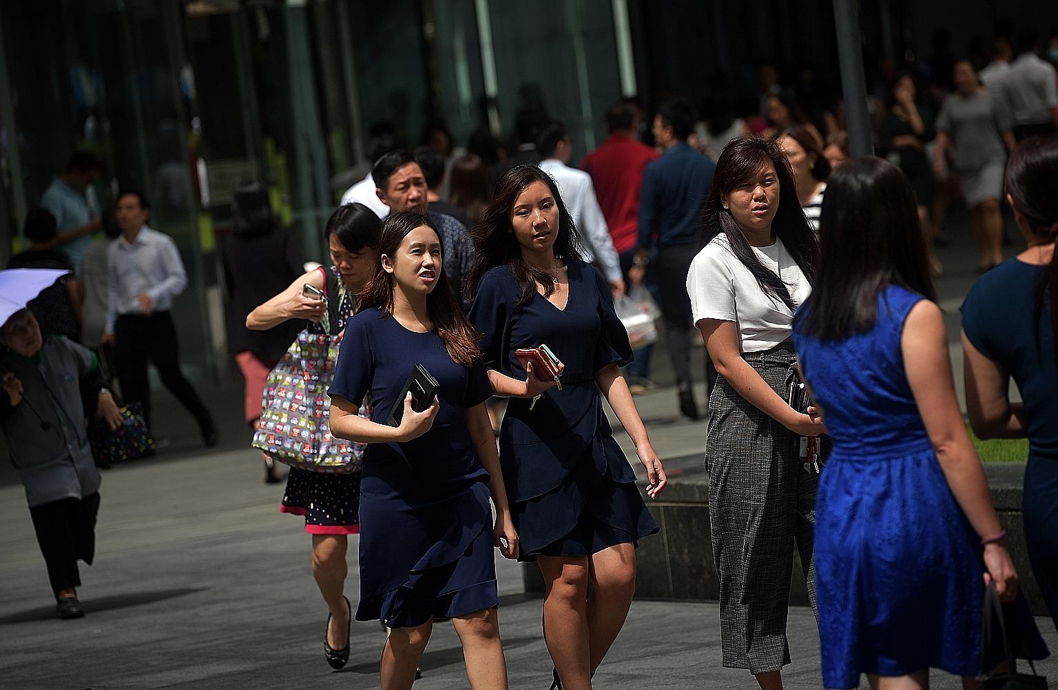 The study noted that more men have jobs with higher levels of wage increases while women tend to be over-represented in roles with lower wage hikes. ST PHOTO: KUA CHEE SIONG