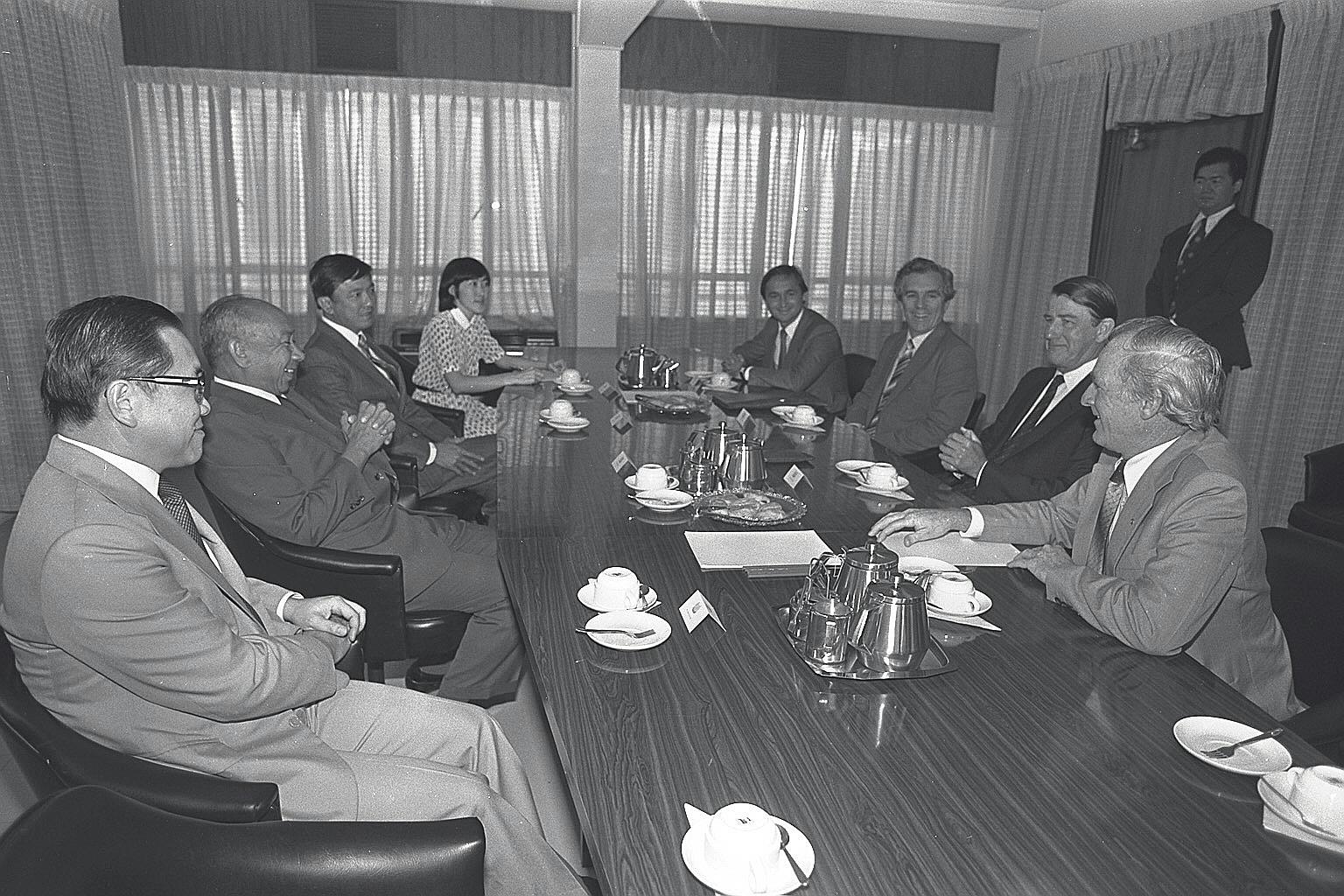 Dr Goh Keng Swee (second from left) and then GIC managing director Yong Pung How (far left) meeting then New South Wales Premier Neville Wran (second from right) and his team in 1982. When Dr Goh approached Mr Yong to helm GIC, Mr Yong was startled,