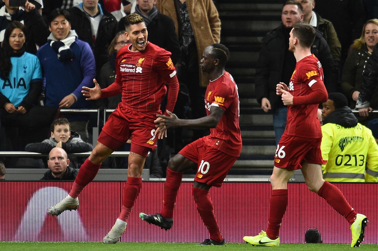 Roberto Firmino celebrating after scoring Liverpool's first-half winner against Tottenham on Saturday. It was his seventh league goal this season, all coming in away games.