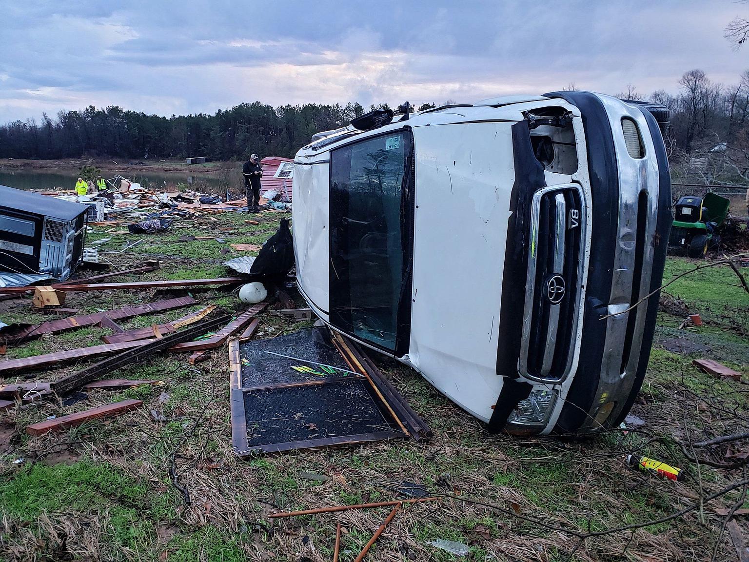 A large vehicle flipped on its side in Bossier Parish, Louisiana, after a tornado with winds of around 217kmh hit the area last Saturday. Severe storms sweeping in the US have killed at least 11 people as high winds, tornadoes and rain battered the c