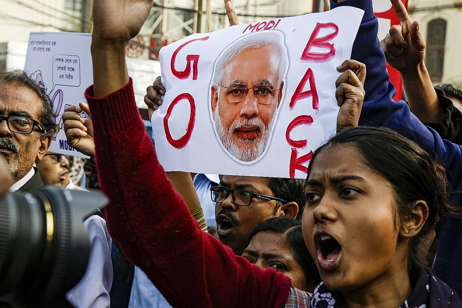 University students protesting against India's new citizenship law and the visit of Prime Minister Narendra Modi to Kolkata last Saturday. The controversial law offers citizenship to non-Muslim illegal migrants from three neighbouring countries - Afg