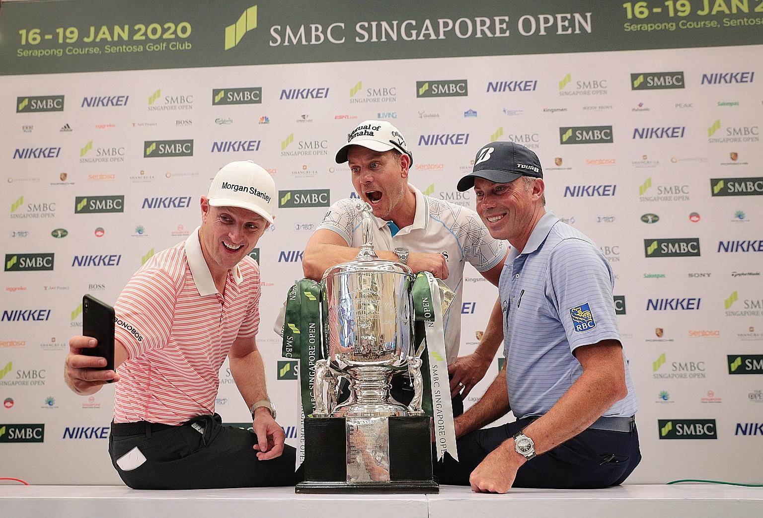 (From left) Justin Rose, Henrik Stenson and Matt Kuchar, who are expected to lead the charge for honours at this week's SMBC Singapore Open, taking a wefie yesterday. ST PHOTOS: JASON QUAH